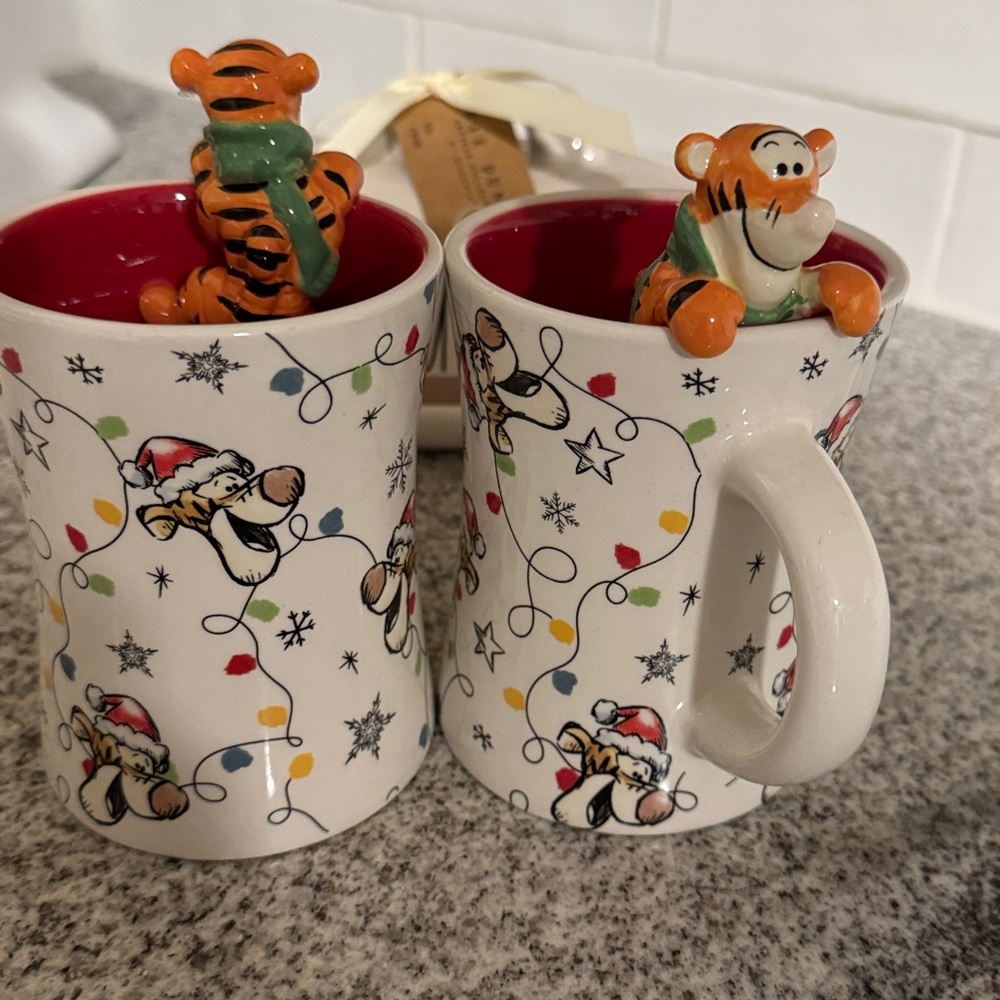 Two  RAE DUNN Tigger Christmas Mugs with Figurines